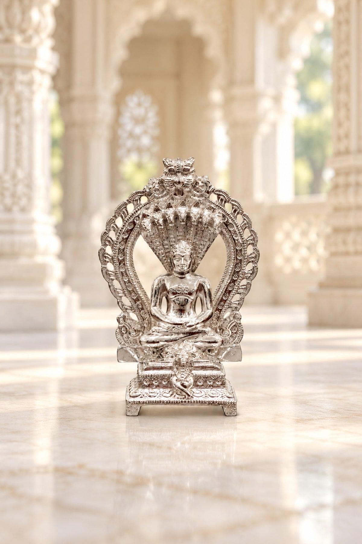 Silver Jain Tirthankara Idol with Serpent Canopy
